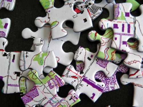 An image of puzzle pieces in a heap